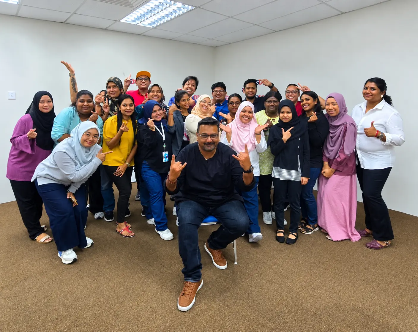 Navin Nair with NN Mastery Academy participants after a corporate training session in Malaysia